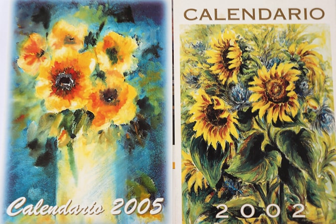 Обложки календарей художников, рисующих с помощью рта и ног